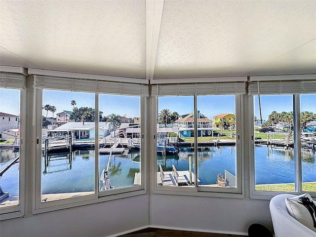 sunroom with a water view