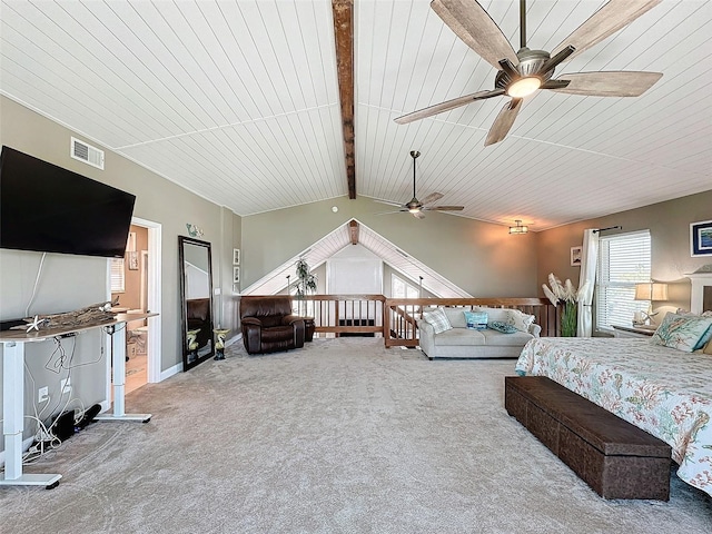 carpeted bedroom with lofted ceiling with beams