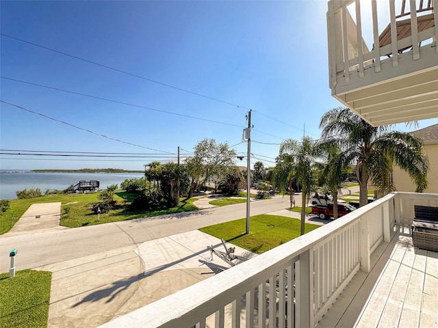 balcony featuring a water view