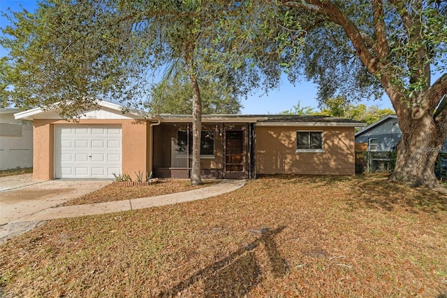 ranch-style home with a garage