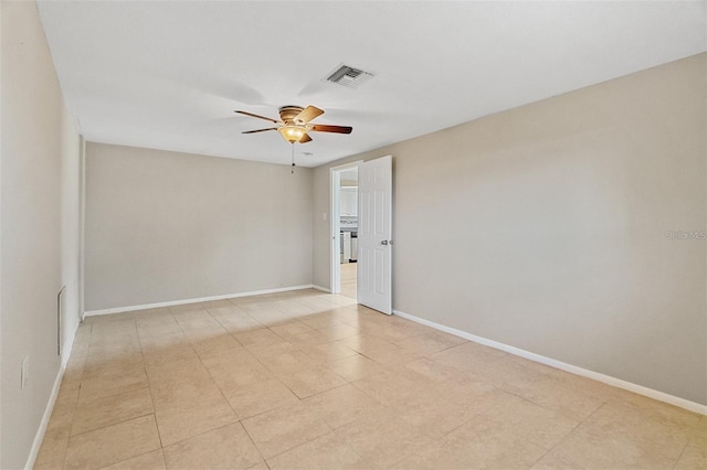 spare room with ceiling fan