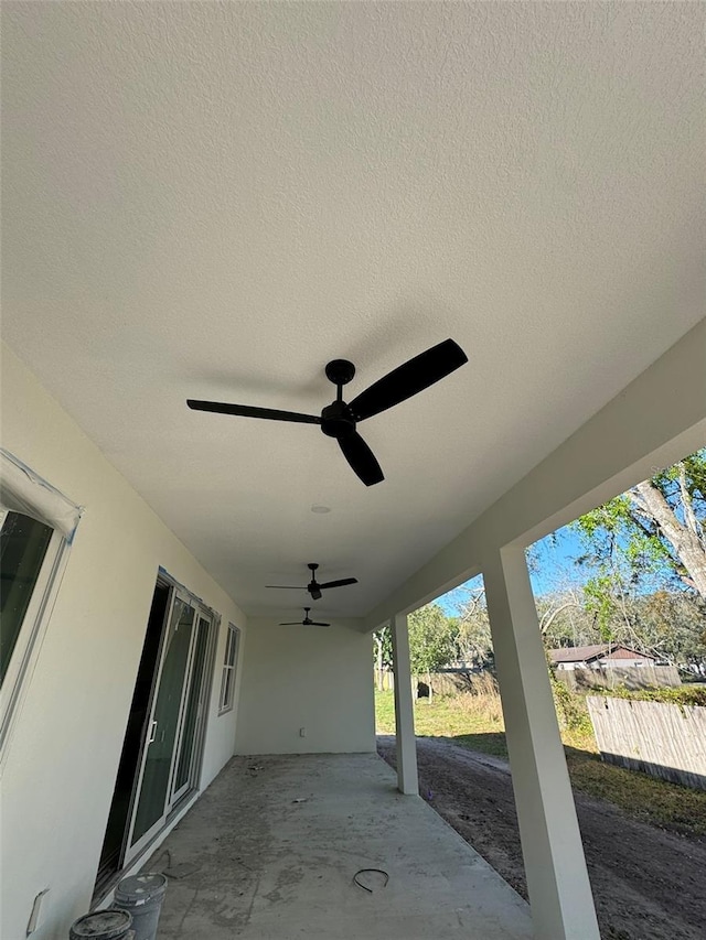 view of patio featuring a ceiling fan