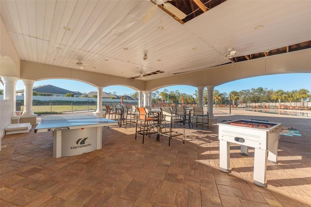 view of patio / terrace featuring a fire pit