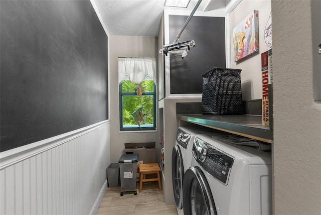 laundry room featuring separate washer and dryer