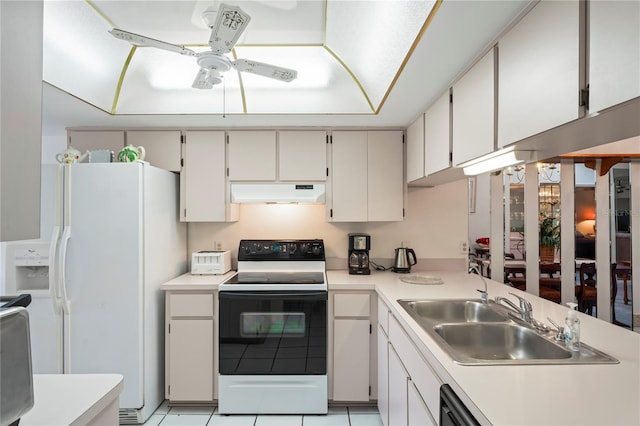 kitchen with sink, ceiling fan, range with electric cooktop, white fridge with ice dispenser, and white cabinets