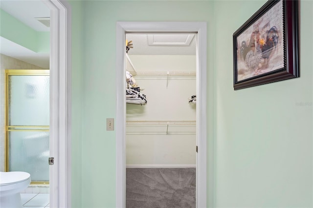 walk in closet featuring tile patterned floors