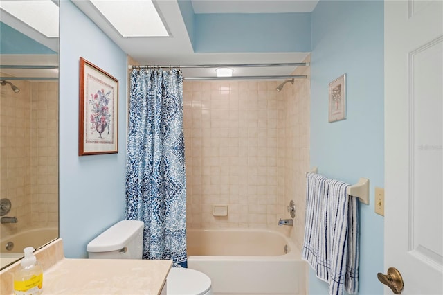 full bathroom featuring shower / bath combination with curtain, vanity, and toilet