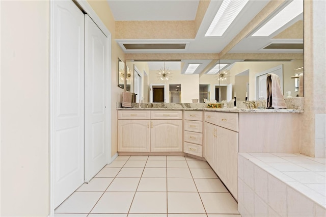 bathroom featuring tile patterned floors and vanity