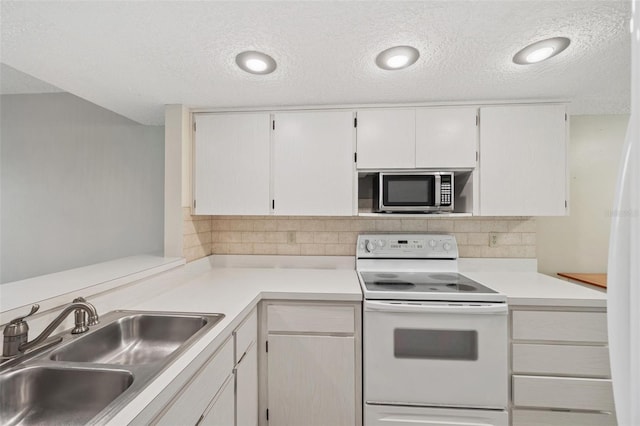 kitchen featuring white electric stove, white cabinetry, sink, decorative backsplash, and a textured ceiling