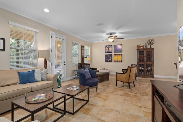 living room with crown molding, plenty of natural light, and ceiling fan