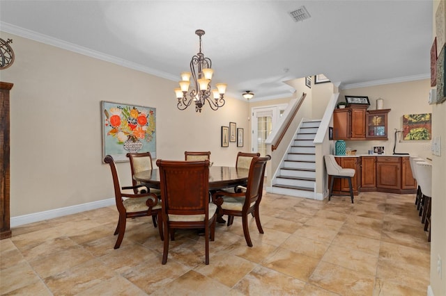 dining area with a chandelier and ornamental molding