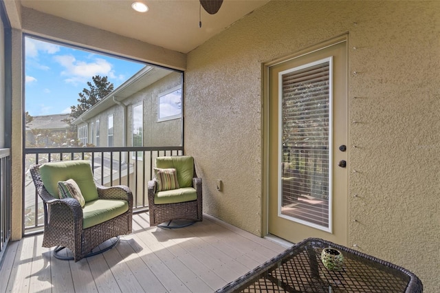 sunroom / solarium with ceiling fan