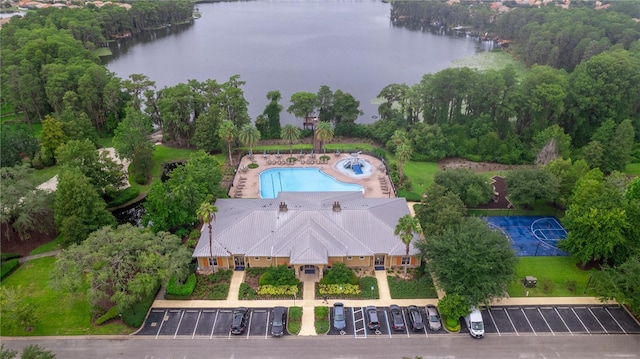 drone / aerial view with a water view