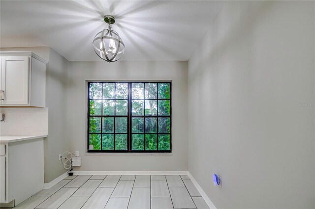 interior space featuring a chandelier