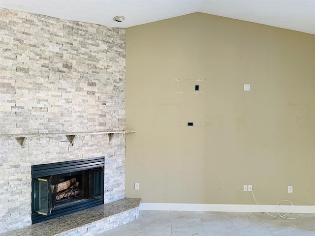 6096 Kinlock Ave, Spring Hill, FL 34608 - unfurnished living room with baseboards, vaulted ceiling, tile patterned flooring, and a fireplace