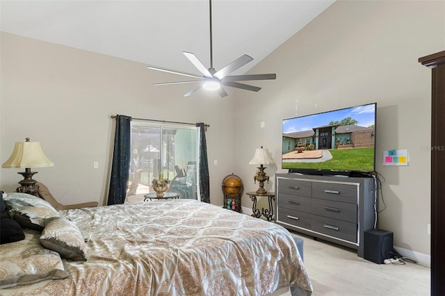 6096 Kinlock Ave, Spring Hill, FL 34608 - bedroom featuring baseboards, ceiling fan, high vaulted ceiling, and access to exterior