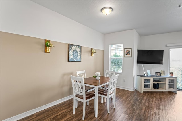 dining room featuring dark hardwood / wood-style floors