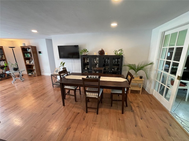 dining area featuring hardwood / wood-style flooring