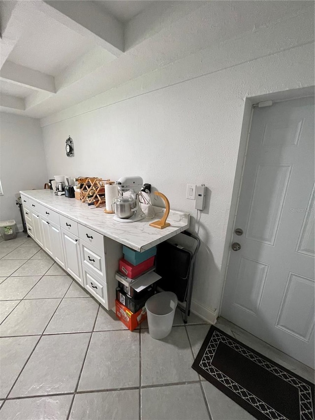 bathroom featuring tile patterned flooring