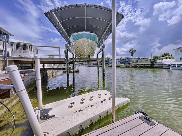 dock area with a water view