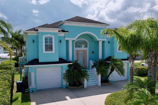 mediterranean / spanish-style house featuring a garage