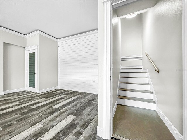 stairs with hardwood / wood-style flooring