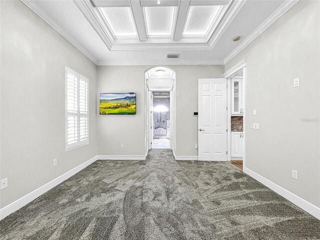 carpeted empty room with crown molding and coffered ceiling