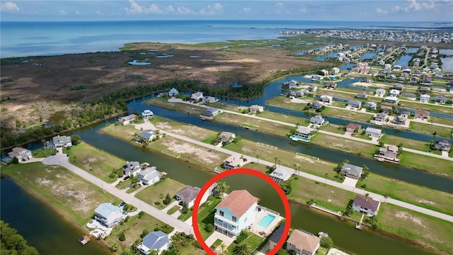 drone / aerial view featuring a water view