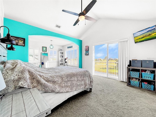 bedroom with carpet floors, vaulted ceiling, and ceiling fan