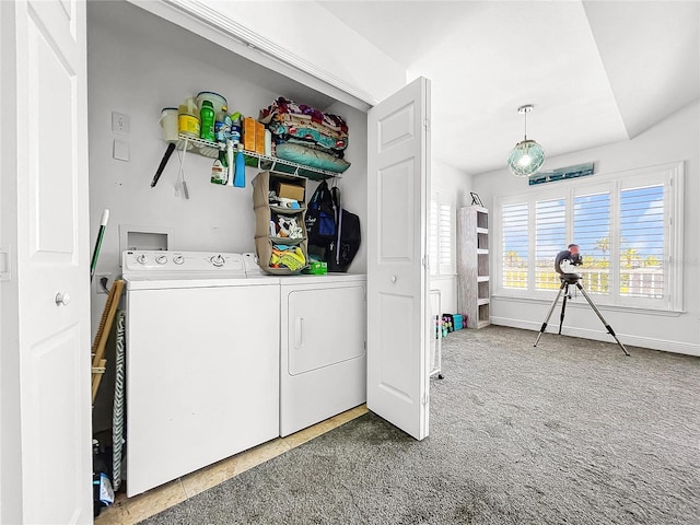 laundry room with carpet flooring and washer and dryer