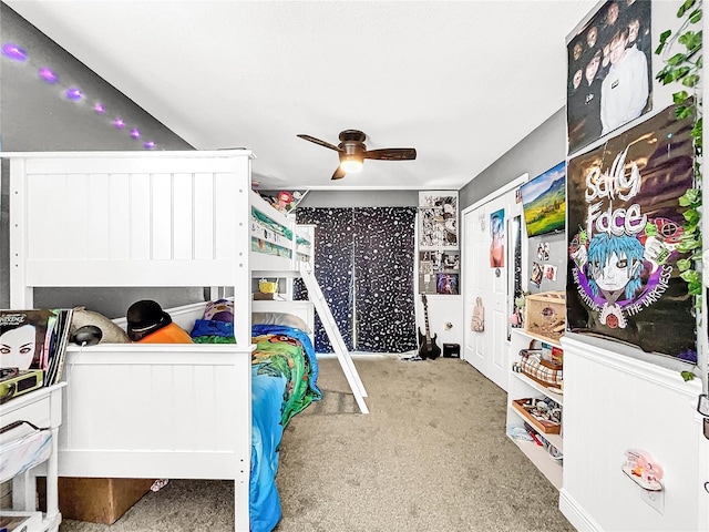 carpeted bedroom featuring ceiling fan