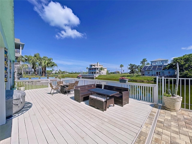 wooden terrace with a water view