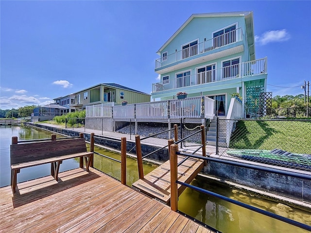 dock area with a water view