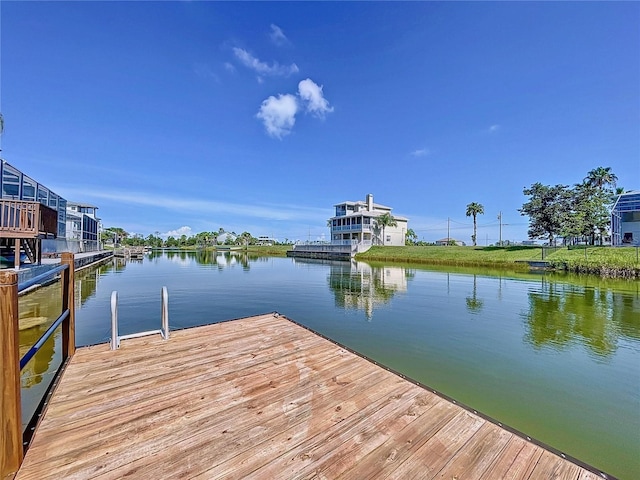 dock area with a water view