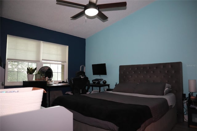 bedroom featuring lofted ceiling and ceiling fan