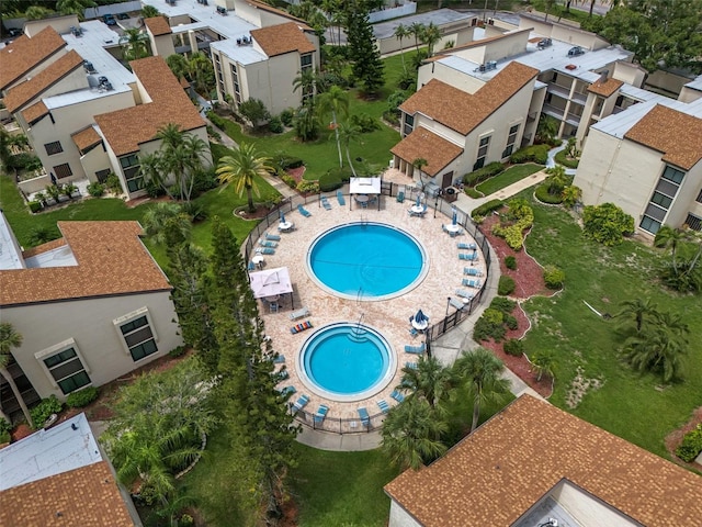 view of swimming pool with a patio area and a jacuzzi