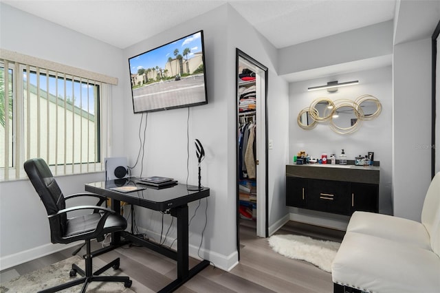2207 Belleair Rd Unit A32, Clearwater, FL 33764 - home office featuring wood finished floors and baseboards