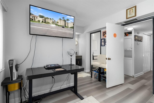 2207 Belleair Rd Unit A32, Clearwater, FL 33764 - office area featuring wood finished floors and a textured ceiling