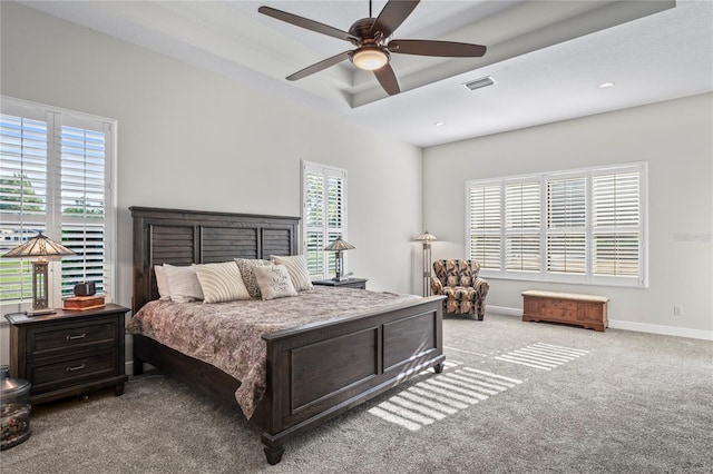 carpeted bedroom with ceiling fan