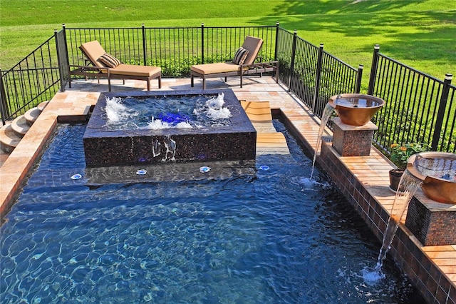 view of pool featuring a yard and pool water feature