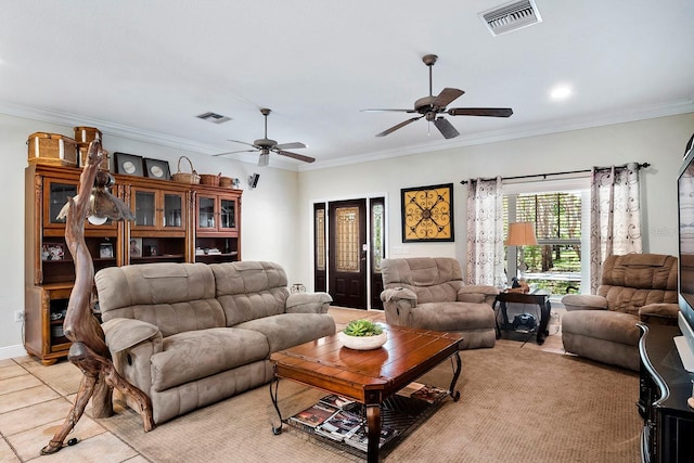 tiled living room with ceiling fan and ornamental molding