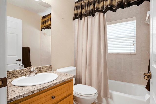 full bathroom featuring vanity, toilet, a wealth of natural light, and shower / bathtub combination with curtain