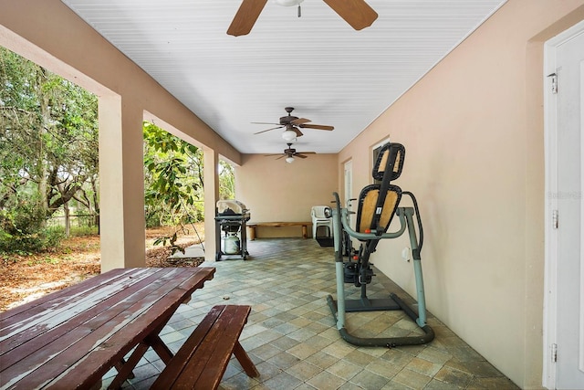 view of patio featuring ceiling fan and grilling area