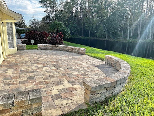 4713 Tiburon Dr, New Port Richey, FL 34655 - view of patio / terrace featuring a water view