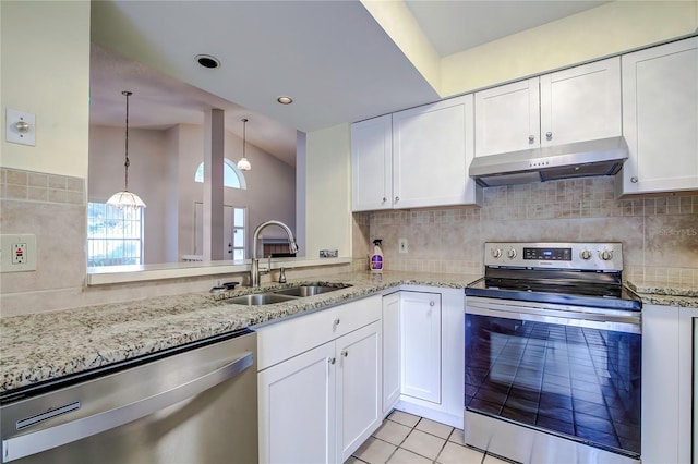 kitchen featuring sink, white cabinetry, decorative light fixtures, and stainless steel appliances