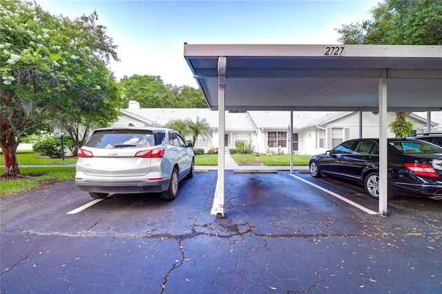 view of car parking with a carport