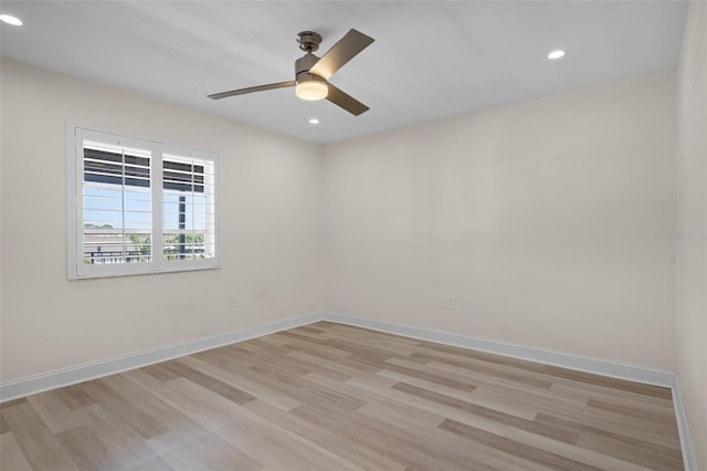 4632 Marine Pkwy Unit 302, New Port Richey, FL 34652 - spare room with light wood-style flooring, a ceiling fan, recessed lighting, and baseboards