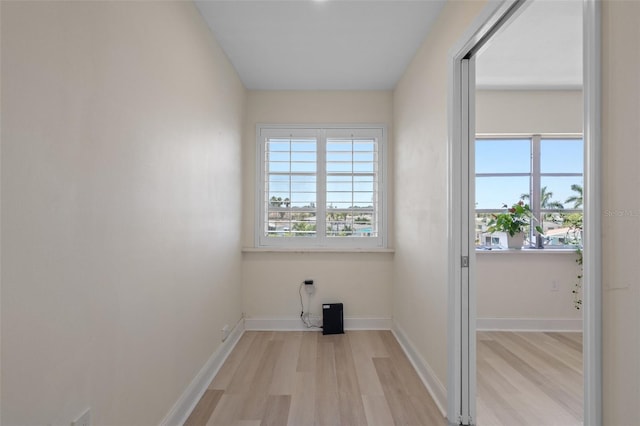 4632 Marine Pkwy Unit 302, New Port Richey, FL 34652 - empty room with light wood-style flooring and baseboards