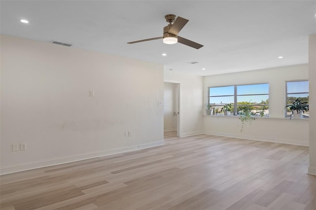 4632 Marine Pkwy Unit 302, New Port Richey, FL 34652 - empty room featuring light wood-type flooring, recessed lighting, ceiling fan, and baseboards