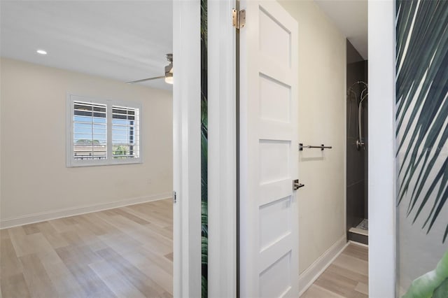 4632 Marine Pkwy Unit 302, New Port Richey, FL 34652 - hall with light wood finished floors, baseboards, and recessed lighting